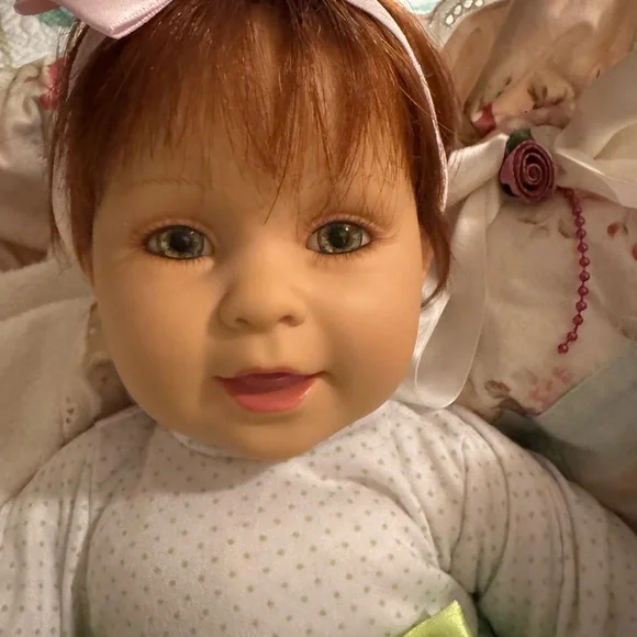 Adorable Baby Doll with Pink Bow - Picture 5 of 9